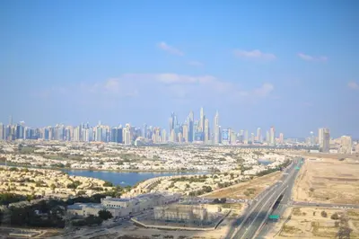 an aerial view of a city with tall buildings at Stunning Studio in Binghatti House in Dubai