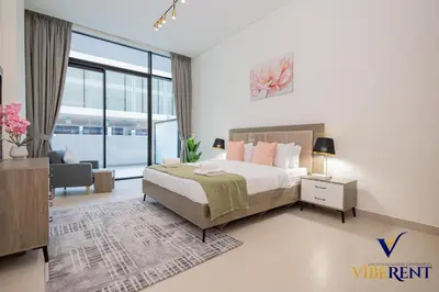 a bedroom with a bed and a living room at 1-BR Binghatti Rooftop Pool, Gym in Dubai
