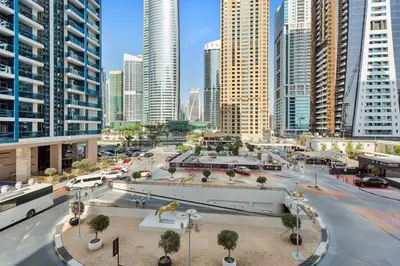 a city skyline with tall buildings and a street at High End 1 Bedroom with Exquisite Layout in JLT in Dubai