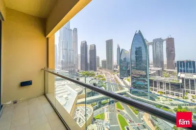 a view of a city from a balcony in a building at Partial Burjkhalifa View from Balcony in Dubai Mall-Studio King Bed in Dubai