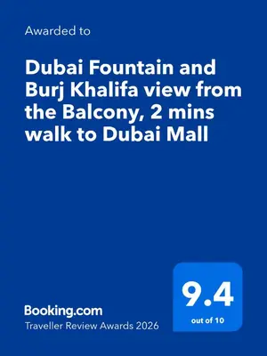 a screenshot of a cell phone with the words dubai tourism and but kl at Souk Al Bahar Dubai Fountain and Burj Khalifa view from the Balcony, 2 mins walk to Dubai Mall by Norbu Holiday Homes in Dubai