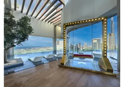 a living room with a view of the city at KeyRock Living - Luxe Retreat at Paramount in Dubai