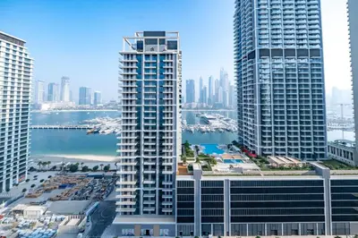a view of a city skyline with tall buildings at Homes Beyond I Seaside 1BR Retreat with Beach Access in Dubai