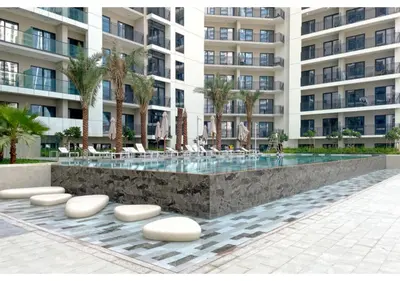 a swimming pool in front of a building at Exclusive Lakeview Haven - Zada Tower by Keyrock Living in Dubai