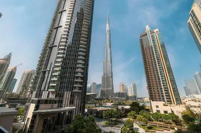 a view of a city skyline with two tall buildings at Vogue Downtown Act One near Burj Khalifa and Dubai Mall, Two Bedroom Apartment with Balcony and City Skyline View, Access to All Amenities in Dubai