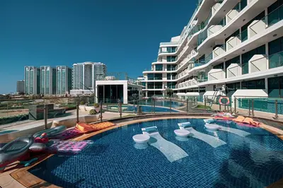 a swimming pool on the roof of a building at NEW 2BR in Arjan with Private Pool in Dubai