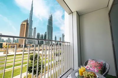 a balcony with a view of the city at Beautiful 2BR - Burj Views And Dubai Mall Connection in Dubai
