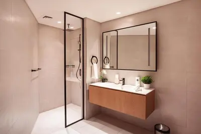 a bathroom with a sink and a shower and a mirror at Elite Royal Apartment - Panoramic Burj Khalifa View - Sky Edition - Luxurious - Zacharyas in Dubai