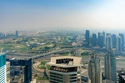 an aerial view of a city with tall buildings at Classy Upgraded High Floor Prime Location in Dubai