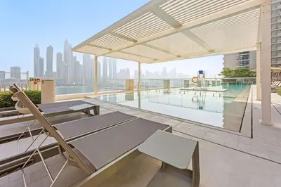 an outdoor patio with a view of the city at Silkhaus Waterfront 1BR in Marina Vista Tower in Dubai