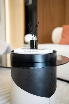 a black and white coffee table in a room at Comfortable 1br Jvc Balcony Parking in Dubai
