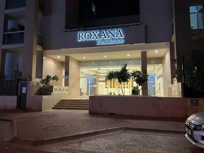 a building with a sign on the front of it at Everything you need for a perfect Dubai Stay in Dubai