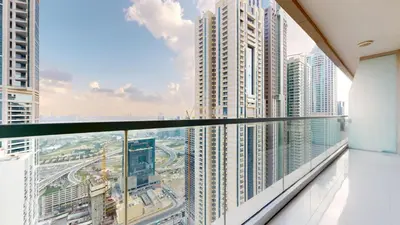 a balcony with a view of a city at Ocean Heights - One Bed with City View of Marina in Dubai