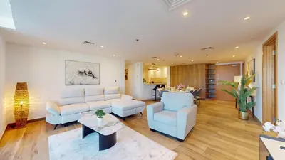 a living room with a couch and chairs and a table at Vacationer I Hidden Gem in Marina l 3 Bedroom I Yacht Views, Free Pool, Gym & Wi-Fi in Dubai