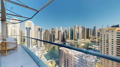 a view of a city from the balcony of a building at Vacationer I Hidden Gem in Marina l 3 Bedroom I Yacht Views, Free Pool, Gym & Wi-Fi in Dubai