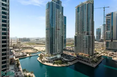 an aerial view of a city with tall buildings at Elegant 1-Bedroom with Stunning Lake View in JLT in Dubai