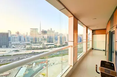 a view of a city from an office building at Prime 1BR Location Minutes to Burj Dubai Mall by Vibel in Dubai