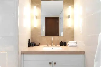 a bathroom with a sink and a mirror at Penthouse Downtown Dubai in Dubai