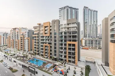 an aerial view of a city with tall buildings at City View Studio Minutes Drive to Burj Khalifa, Azizi Riviera 43, Al Merkadh by Deluxe Holiday Homes in Dubai