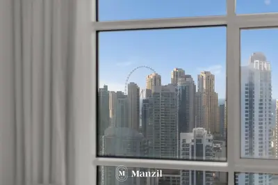 a view of a city skyline from a window at 1BR Apartment in JLT 2km to JBR Beach & Blue Waters Dubai in Dubai