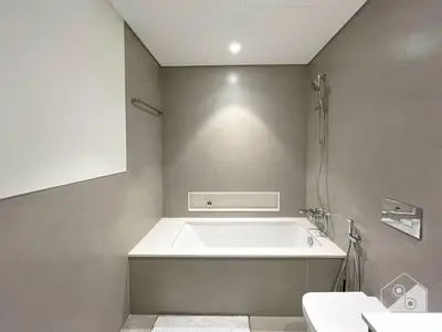 a bathroom with a bath tub and a sink at Grande Luxury 1B With Balcony & City Views in Dubai