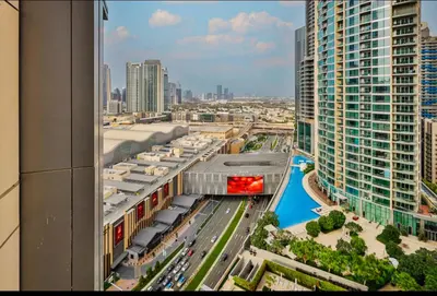 an aerial view of a city with tall buildings at 