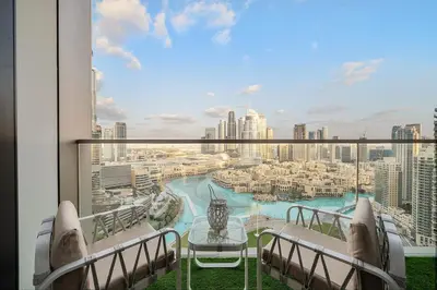 a balcony with a view of a city at FIRST CLASS 2BR Burj Khalifa & Fountain view in Dubai