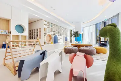 a room with toys and furniture in it at FIRST CLASS 2BR Burj Khalifa & Fountain view in Dubai