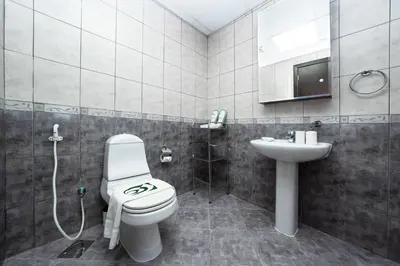 a bathroom with a toilet and a sink at 2 Bed in Atlantic Tower 2 by PK Holidays in Dubai
