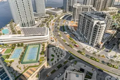 an aerial view of a city with tall buildings at Stonetree - Spacious 2BR at Dubai Creek Residences in Dubai