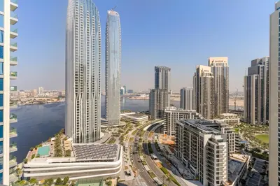 an aerial view of a city with tall buildings at Stonetree - Spacious 2BR at Dubai Creek Residences in Dubai