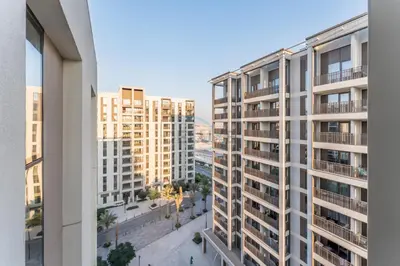 an aerial view of buildings in a city at Community View 2BR with Balcony, Surf at Creek Beach Building 2, Creek Harbour by Deluxe Holiday Homes in Dubai