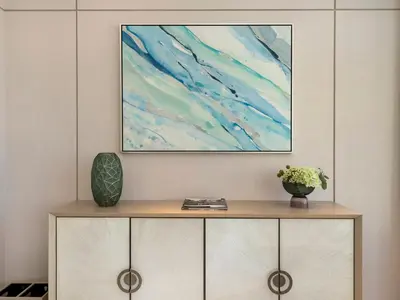 a cabinet with a painting on the wall at FIVE luxe JBR - High Floor Studio - Pool & Beach Access - Ventura Stays in Dubai