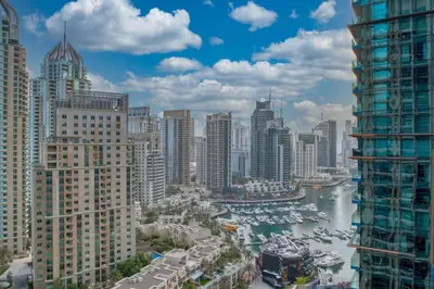 a view of a city with a river and buildings at Dubai Marina, Beach & Marina View , 2 Bed Perfect for Groups in Dubai