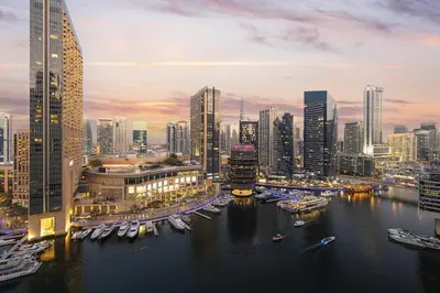 a view of a city with boats in the water at Panoramic Marina View - 1BR - Walk to the beach in Dubai