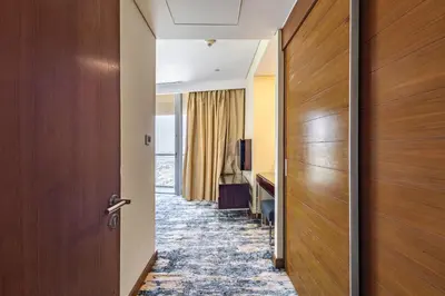 a corridor of a hotel room with a door at SuperHost EMAAR Residences - Former Address Dubai Mall in Dubai