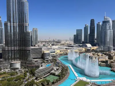 a view of a city with tall buildings at Downtown Luxury 2BR - Full Burj Khalifa & Fountain Views - 5 Minutes Walk to Dubai Mall in Dubai