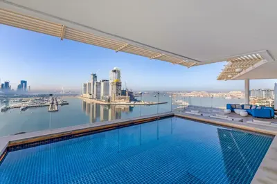 a swimming pool on the roof of a building at luxury penthouses see view at five in Dubai