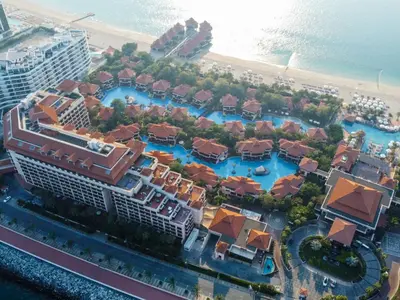 an aerial view of a resort on the beach at Fresh 3BR Apartment in 5-star Resort in Dubai