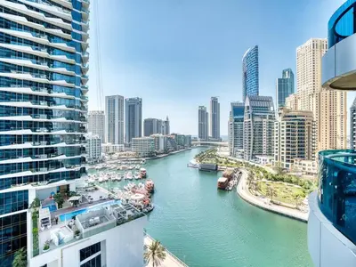 a view of a river in a city with buildings at Classic Orra Marina-1BR in Dubai