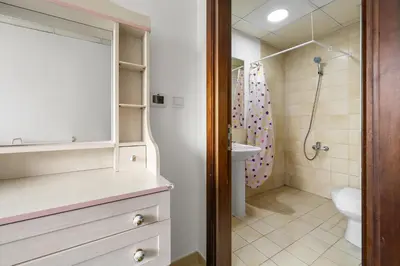 a bathroom with a sink and a toilet and a shower at 3BR plus Maid Executive Tower L, City View in Dubai