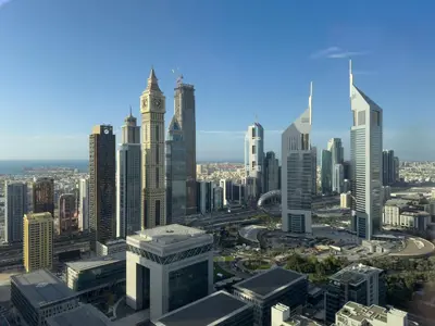 an aerial view of a city with tall buildings at Stylish Luxury in the Heart of DIFC in Dubai
