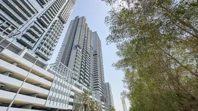 a view of tall buildings in a city at Fully Furnished Cozy Studio at JVC Dubai, Short Drive to Dubai Marina, JBR, Downtown Dubai in Dubai