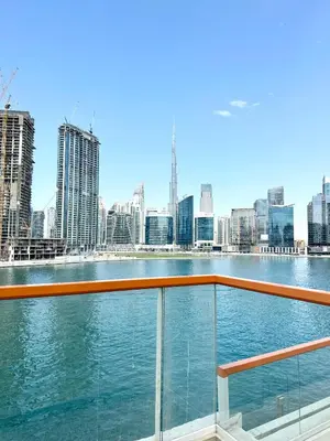 a view of the city from a cruise ship at Millenium Binghatti Residences Business Bay- Stylish Studio with Canal View in Dubai