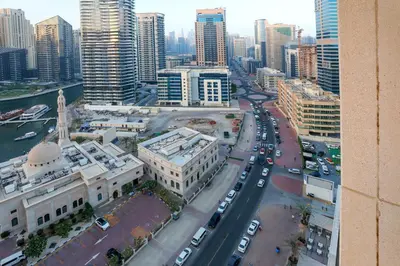 an aerial view of a city with buildings and cars at LUXURY 1BED MARINA VIEW JBR BEACH POoL PARKING in Dubai