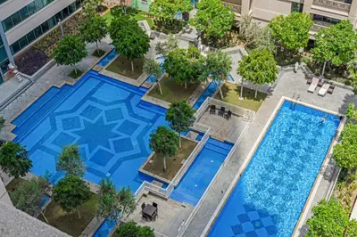 an overhead view of a pool in a building at Lux Burj and Fountain views Steps from Dubai Mall in Dubai