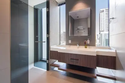a bathroom with a sink and a mirror at MBL Royal, JLT- Two Bedroom with Lake View in Dubai