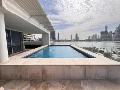 a swimming pool on the roof of a building at Daniels 4BR at Five Palm With Private Pool in Dubai