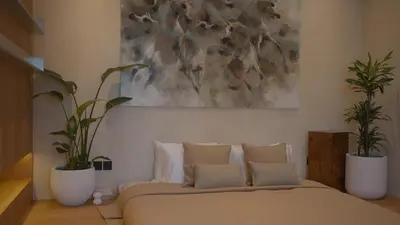 a bedroom with a bed with two potted plants at Mori - luxury Burj full view in Dubai