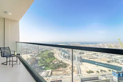 a balcony with a view of the ocean at Silkhaus Luxury 2BDR at Aykon City in Business Bay in Dubai